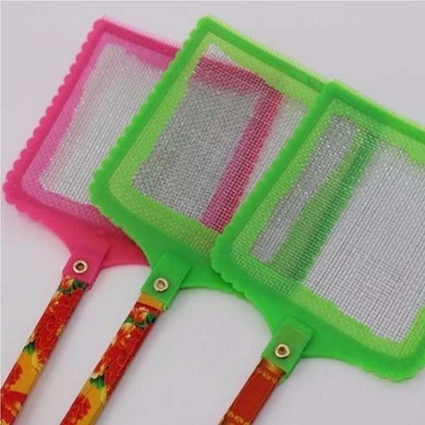 Large fly swatter with a long handle and an unbreakable head, with a scratcher on the other side. An old-fashioned plastic household manual fly swatter.