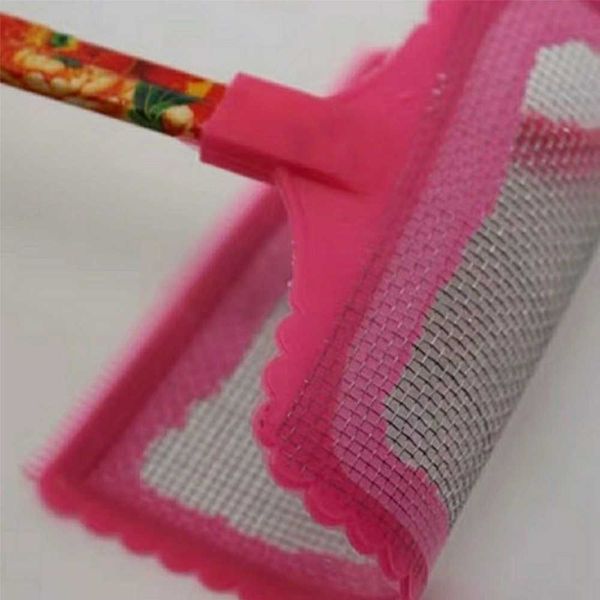 Large fly swatter with a long handle and an unbreakable head, with a scratcher on the other side. An old-fashioned plastic household manual fly swatter.