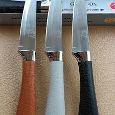 7-inch professional kitchen knife, stainless steel with polished finish and plastic handle
